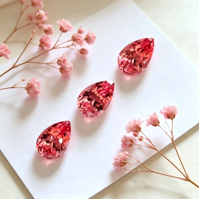 Фото Лабораторный изолированный гранат Padparadscha красного цвета, грушевидной формы, с сертификатом №4
