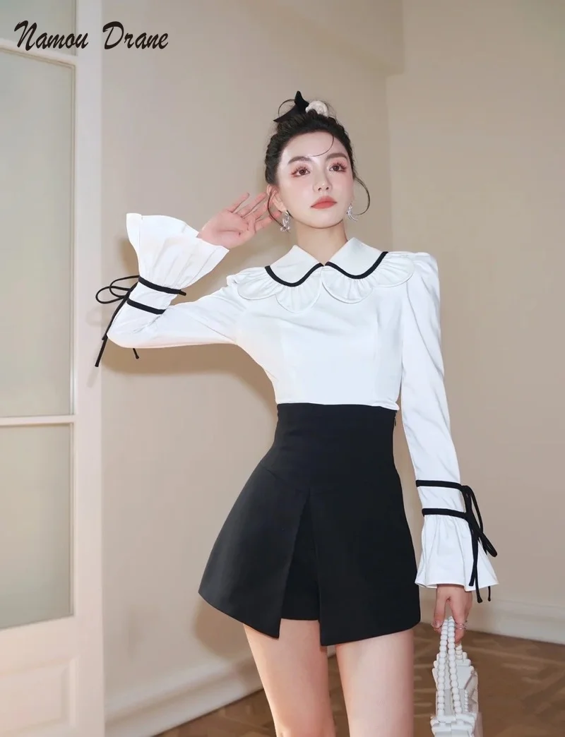 

2022 High Quality Black and White Contrasted Flowers Lapel Tie Flared Sleeve Shirt Top + High Waist Split Culottes 2 Piece Sets