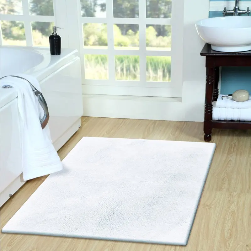 

, Soft & Cozy Soft & Cozy, Micro-Poly Tufted 21'' x 34'' White Bath Rug – Perfect For Any Bathroom Decor.
