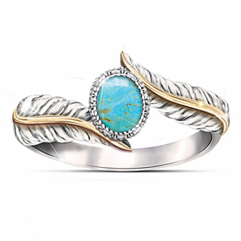

Mifeiya Trendy Ethic Style Two-tone Double Feather Hold Oval Stone Crystal Ring for Women Men Party Jewelry