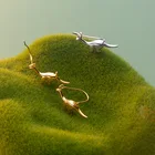Оригинальные блестящие золотые мини-серьги-гвоздики в форме динозавра для женщин 2022 модные трендовые медные корейские милые серьги с крючками в виде животных Ювелирные изделия