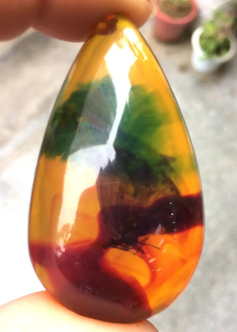 

Certificate Natural Mexican Amber Beeswax Amber Butterfly Pendant 33*68*23mm