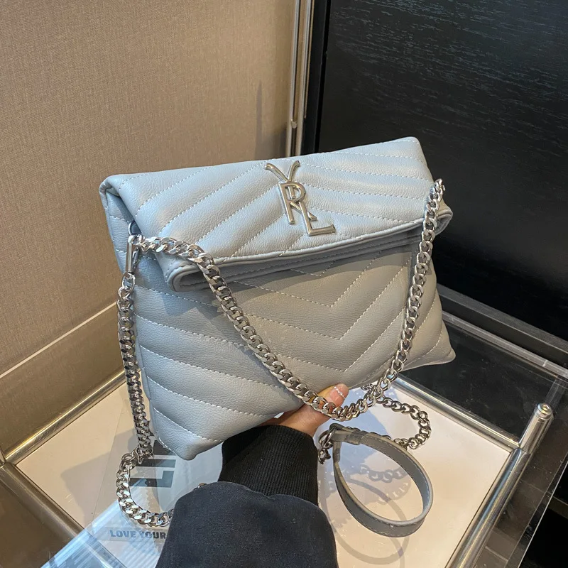 

2023 Solid Color PU Trend Personalized V-shaped Sewing Simple Women's Bag Single Shoulder Bag Messenger Bag Chain Women's Bag
