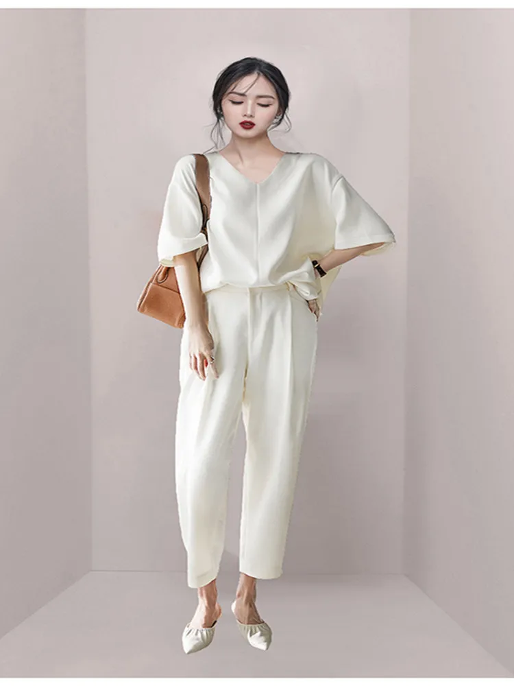 

DALMAZZO Spring And Summer Women's 2 Piece Sets V Neck Pullover Half Sleeve Tops + High Waist Casual Nine-Point Pants Suits 2023