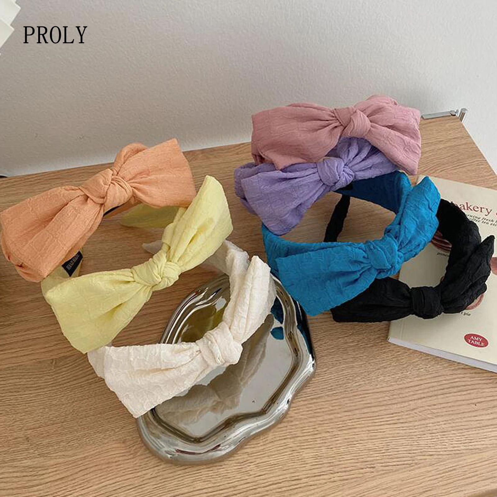 

Повязка на голову женская однотонная с большим бантом, на весну