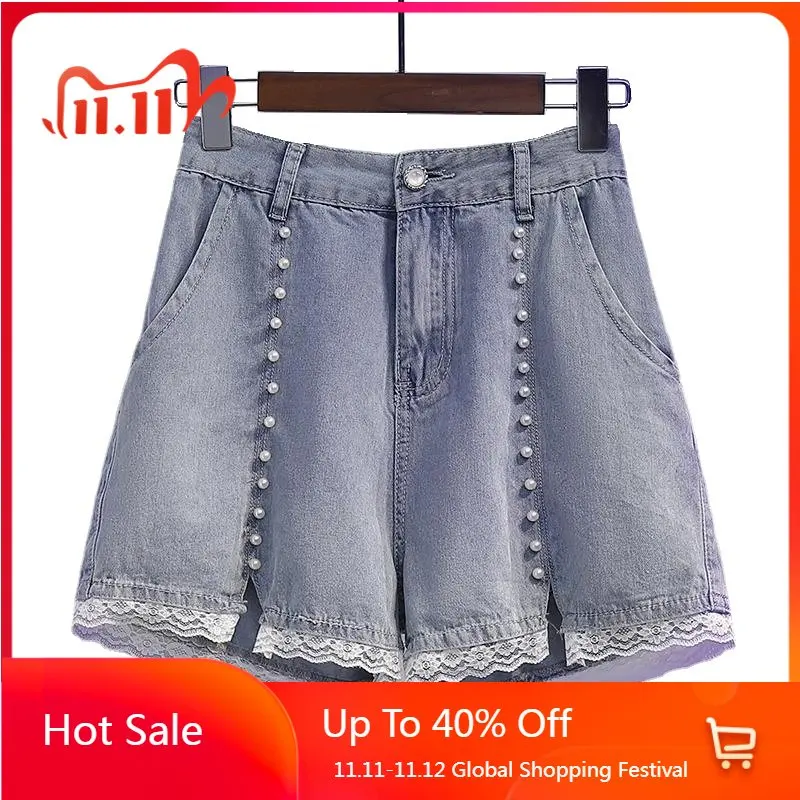 

Женские кружевные короткие джинсы с разрезом и вышивкой, летние женские шорты с карманами и пуговицами на молнии, сплошная шикарная трапеци...
