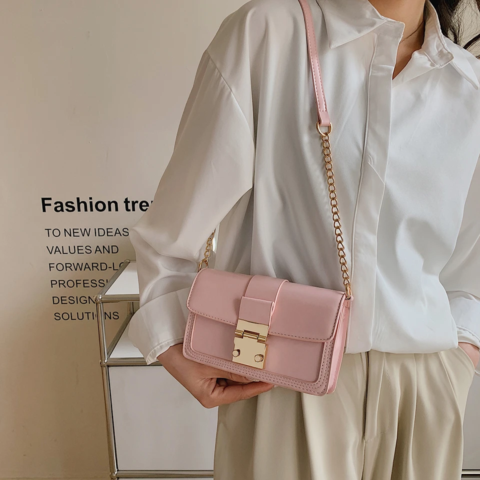 

Fashion one-shoulder diagonal ladies bag. Solid color bag. New products for summer 2022. Metal chain shoulder strap. Flip zipper