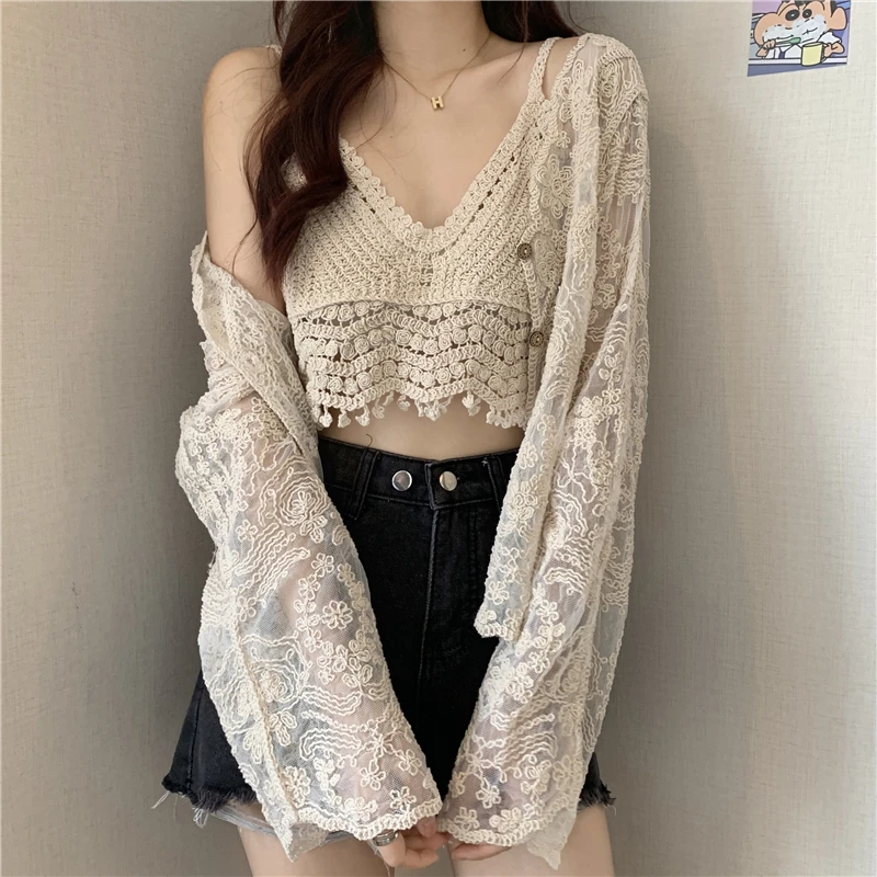 

A small shirt with suspenders, a summer cardigan, a thin short coat, and a hollow out sunscreen lace shirt for women