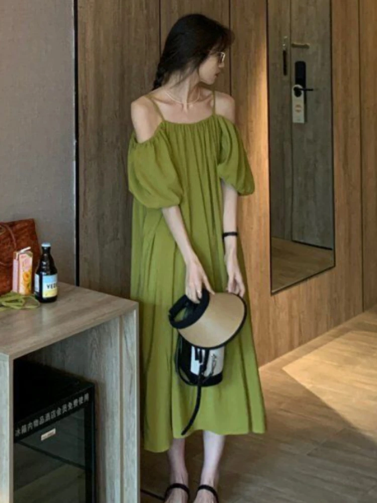 

Новые летние платья для женщин 2023 французское платье на бретельках с открытыми плечами Черное женское платье свободное женское длинное пикантное платье одежда