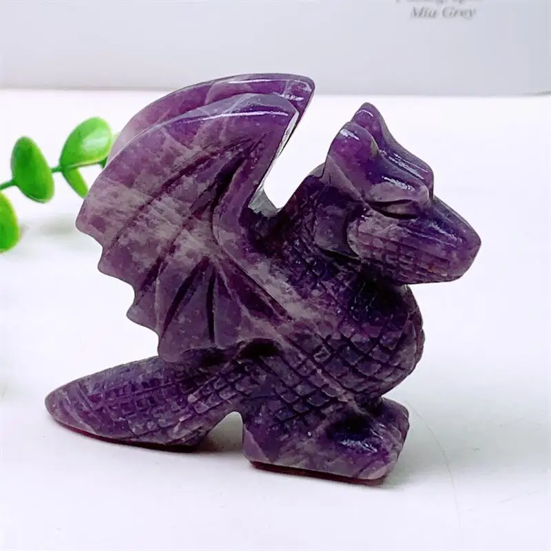 

Фиолетовая статуэтка дракона из камня