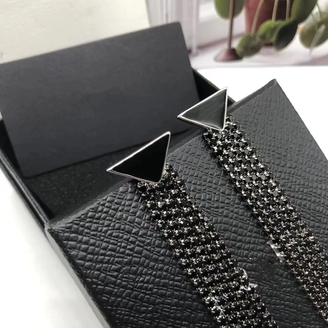 

European and American popular triangle tassel earrings