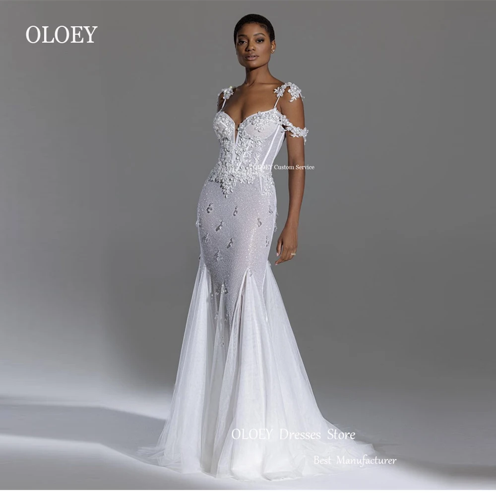 

OLOEY Glitter Mermaid Wedding Dresses Spaghetti Straps Flowers Applique Pearls African Bridal Gowns Modern 2023 Robe de mariage