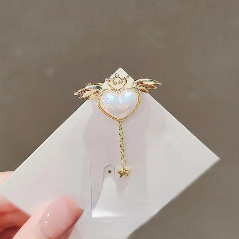 

Korean Fashion Angel Wings Brooch Lapel Pins Crystal Heart-shaped Tassel Brooches for Women Corsage Jewelry Accessories