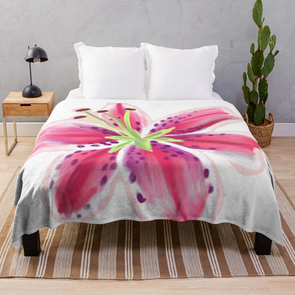 

Синее плиточное одеяло Missoni, белое одеяло Stargazer Lily