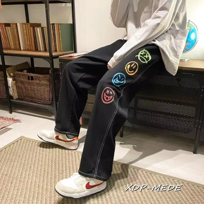 

2023New Smiley Print Black Jeans for Mens Straight Leg Pants Teen Hip Hop Denim Harem Trousers Baggy Boyfriend Style Streetwear