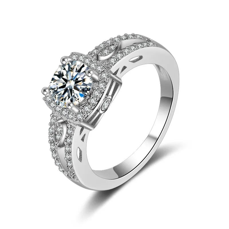 

Gold plated ring with diamond in white copper