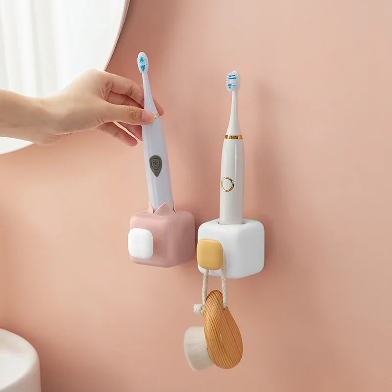 

Новый держатель для электрической зубной щетки-это удобный крючок для ванной комнаты для бытового быстросохнущего хранения без отверстий для пробивания отверстий