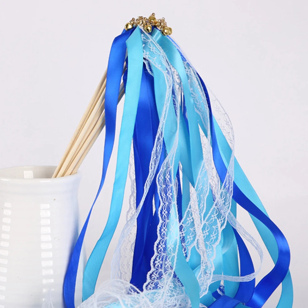 

Свадебные палочки с лентами и колокольчиками