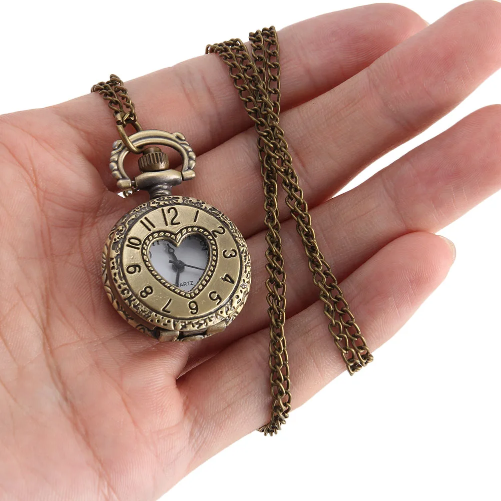 Orologio Da Tasca Vintage Orologio Al Quarzo Color Bronzo Cool Chain Hollow Love Heart Orologi Ll @ 17