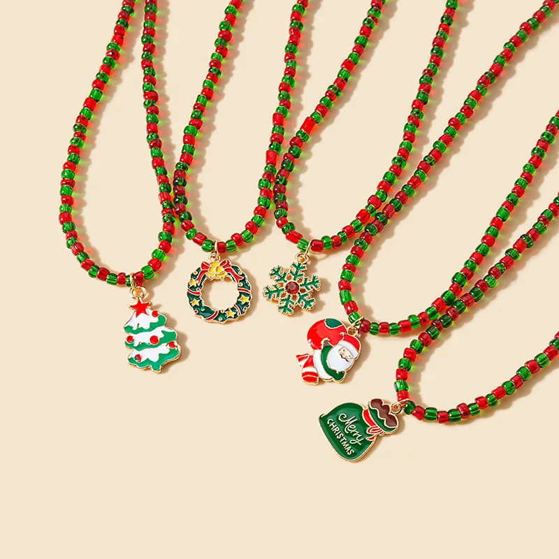 

2022 New Christmas Jewelry Gift Classic Cartoon Sweet Woman Enamel Christmas Tree Santa Pendant Earrings Bracelets Necklaces