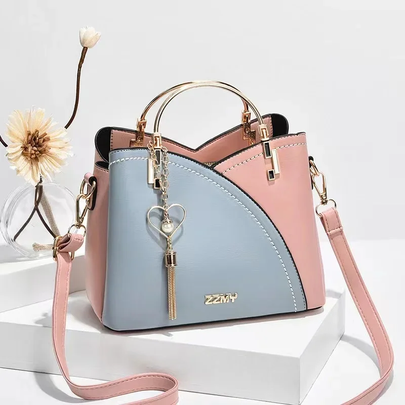 

Women's bag Korean version of the new trendy handbag metal hand-held contrast color fashion shoulder bag Messenger bag