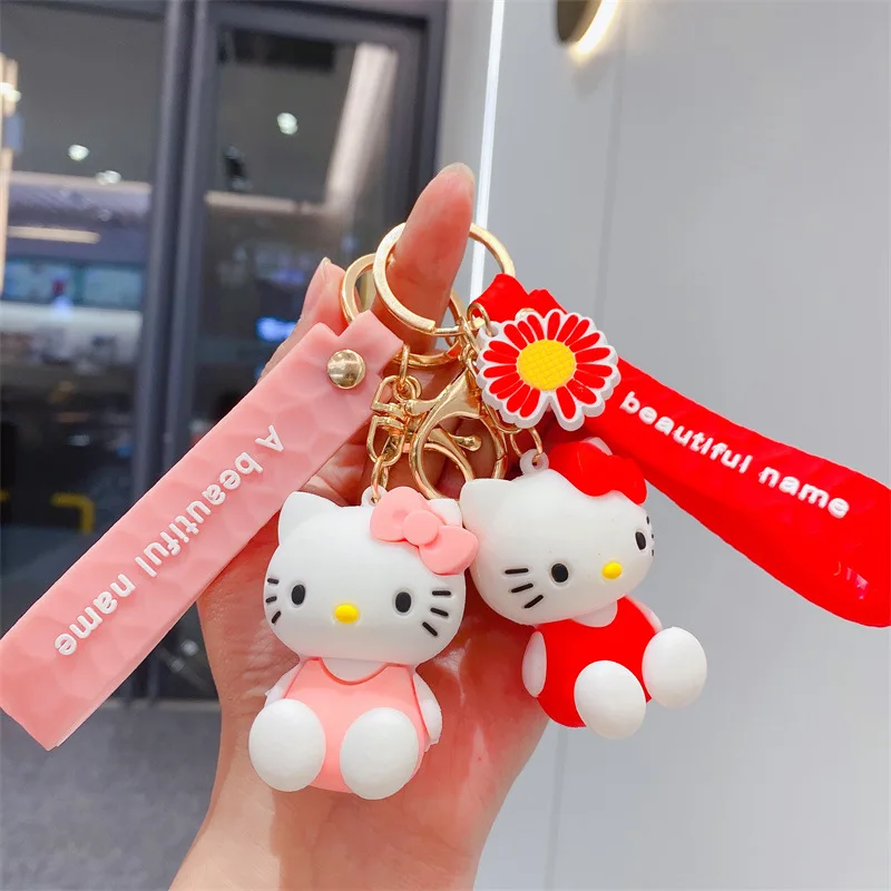 

New Kawaii Sanrioed Anime Cartoon series Creative cute sitting pose HelloKitty keychain cartoon doll keychain bag pendant gift
