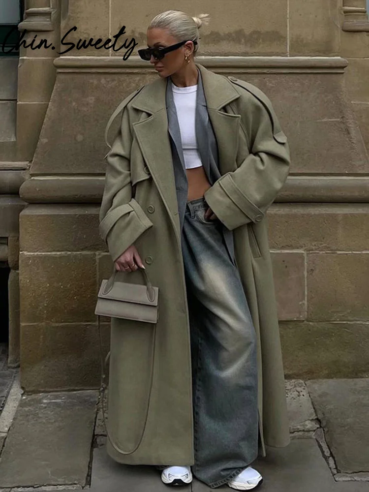 Однотонное двубортное длинное женское пальто с длинными рукавами на шнуровке