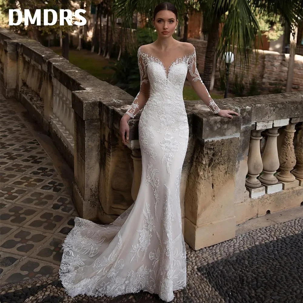 

Sexy Illusion Mermaid Wedding Dresses Sweetheart Neck Illusion Back Court Train Long Sleeves Appliques Trumpet Bridge Gown