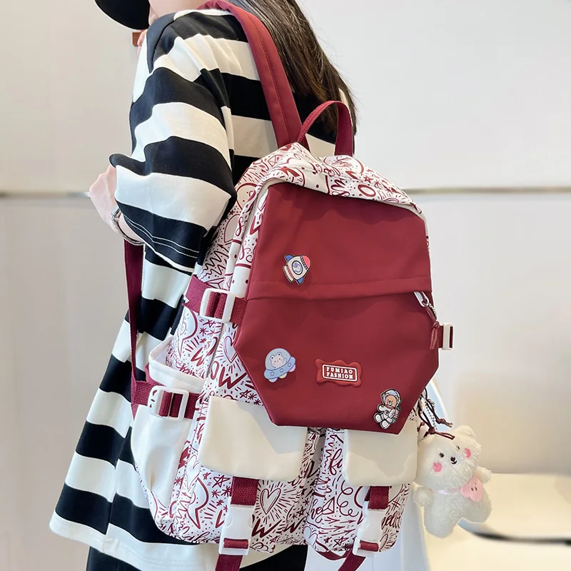 

Fashion Women Cartoon Print School Bag Trendy Lady Badge College Backpack Cute Girl Travel Book Backpack Female Laptop Nylon Bag