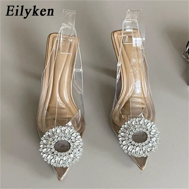 

Eilyken новый дизайн для женщин женские туфли-лодочки с острым носком из прозрачного ПВХ с украшением в виде кристаллов Стразы на высоком каблуке Свадебная вечеринка и ремешком на пятке; Босоножки