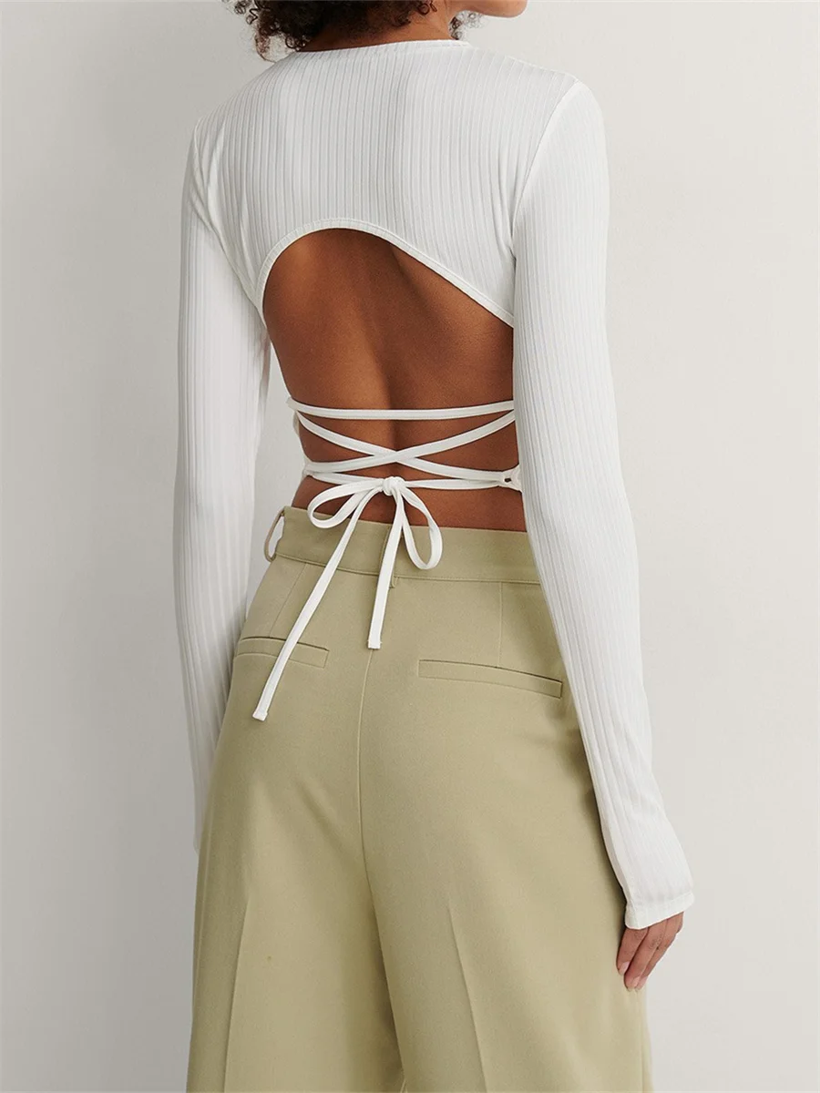 шнуровка корсета на платье. топ на завязках сзади. топ с застежкой на спине. завязку спины. завязку спины.