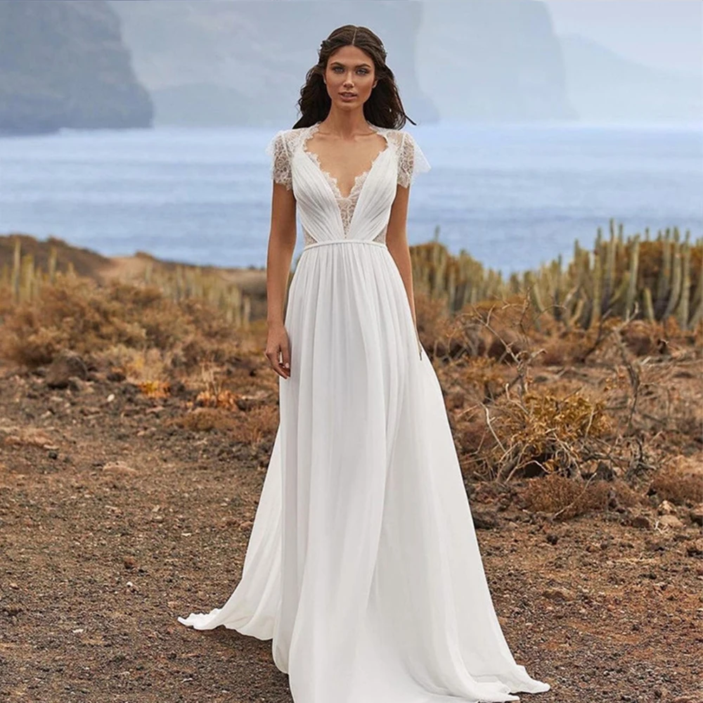 

Elegant Boho Wedding Dresses 2022 V-Neck Sleeveless Chiffon Dress A-Line Pleated Lace Button Cap Sleeve Sweep Train Bridal Gowns