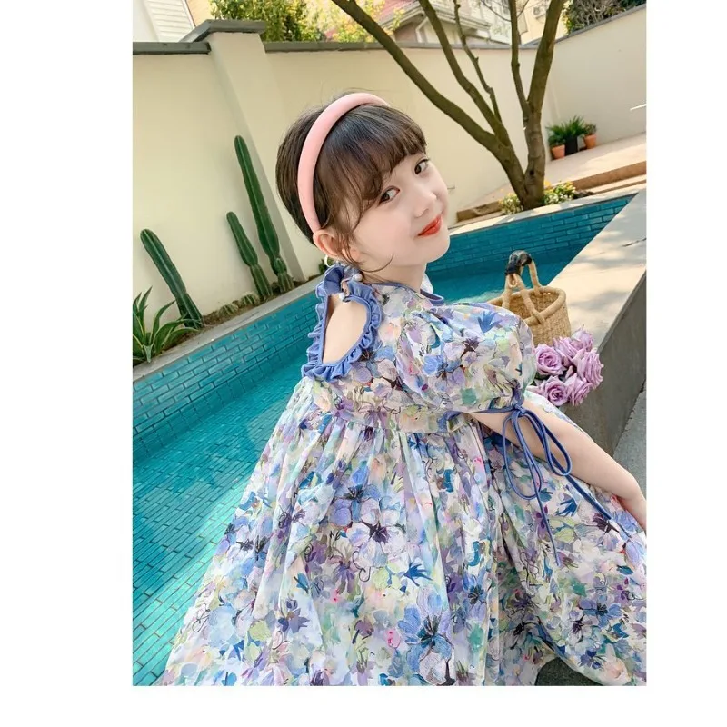 Женское летнее платье с открытой спиной и коротким рукавом