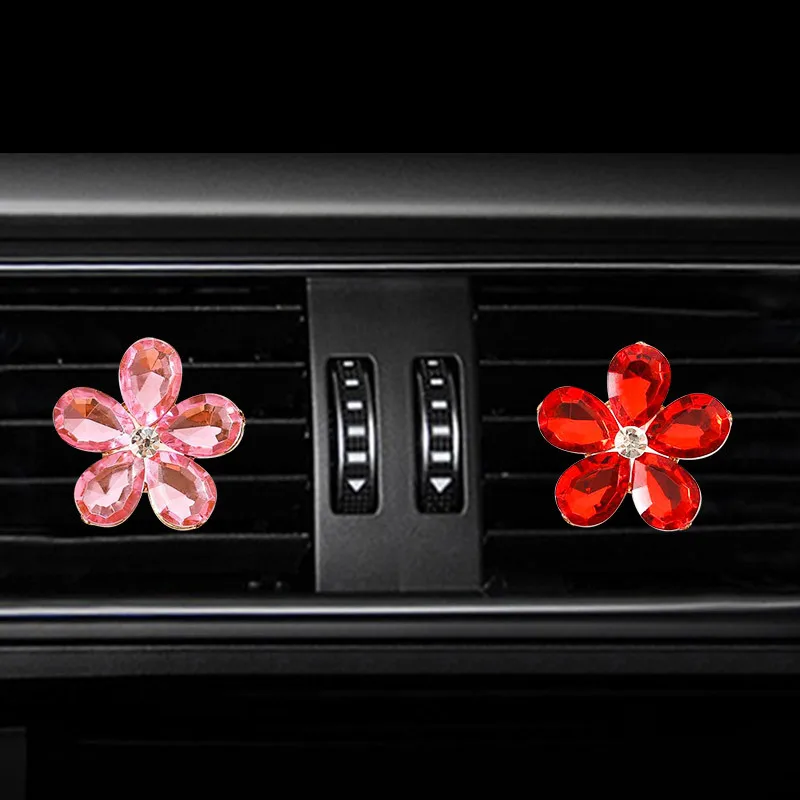 

Crystal five-leaf flower outlet perfume clip High-end creative car air outlet perfume clip car perfume solid aromatherapy