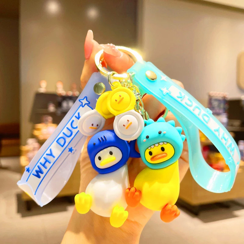 

Funny Duck Doll Keyring Creative Lovely Sitting Duck Key Chain Pendant Dinosaur Shark Head Bag Decoration Car Keyring