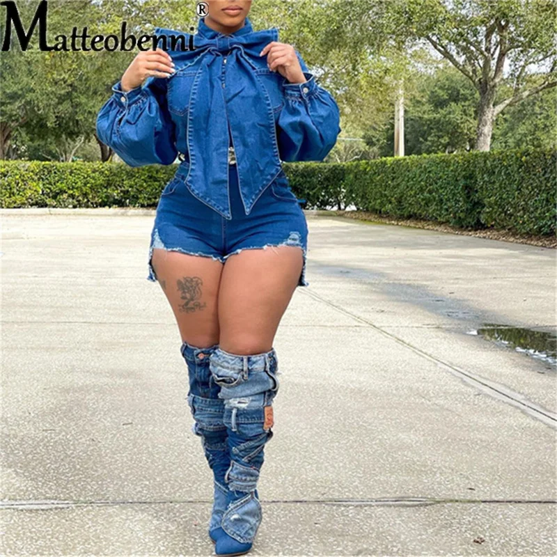 Женский джинсовый комбинезон повседневный рваный с рукавами-фонариками и бантом