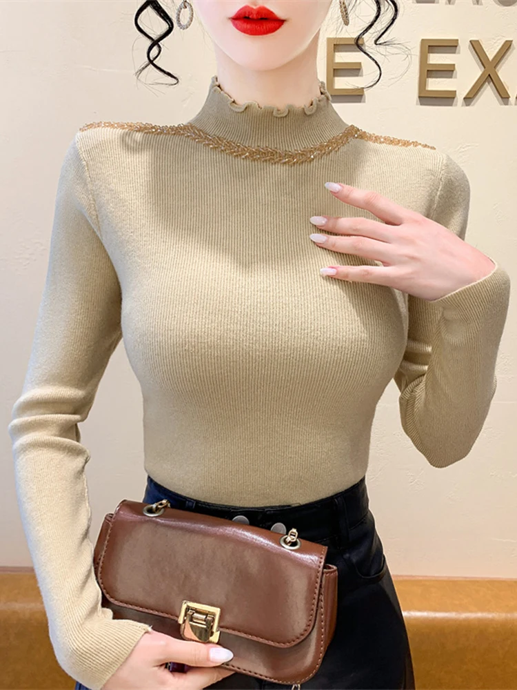 Женский трикотажный свитер с длинным рукавом и воротником-стойкой