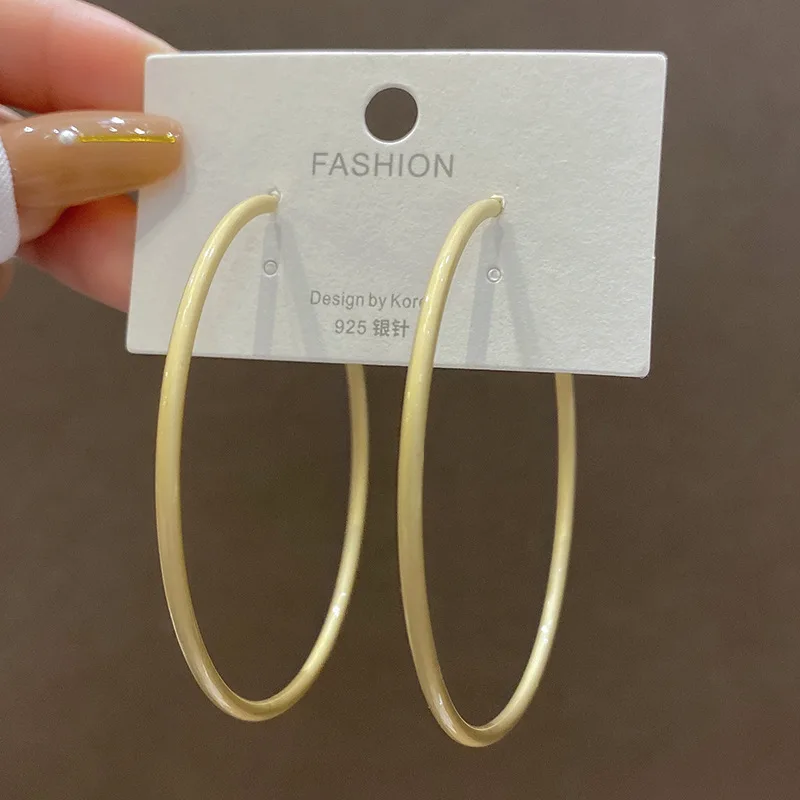 

Серьги-кольца женские из серебра 925 пробы с матовым золотом