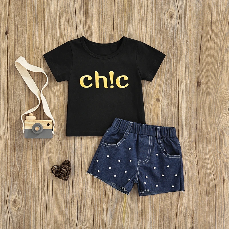 

1-6Y Fashion Kids Baby Girls 2pcs Clothes Sets Children Letter Printed Short Sleeve T Shirts+Blue Denim Pearl Shorts Sets