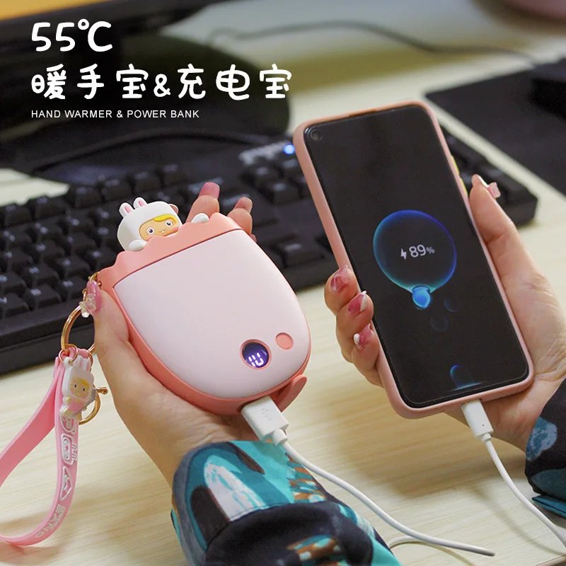 

Warm hand keychain doll USB charging treasure handbao mobile power portable two-in-one electronic gift
