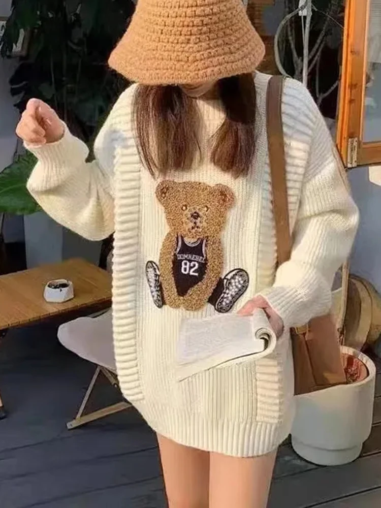 Женский трикотажный свитер с круглым вырезом весна 2024