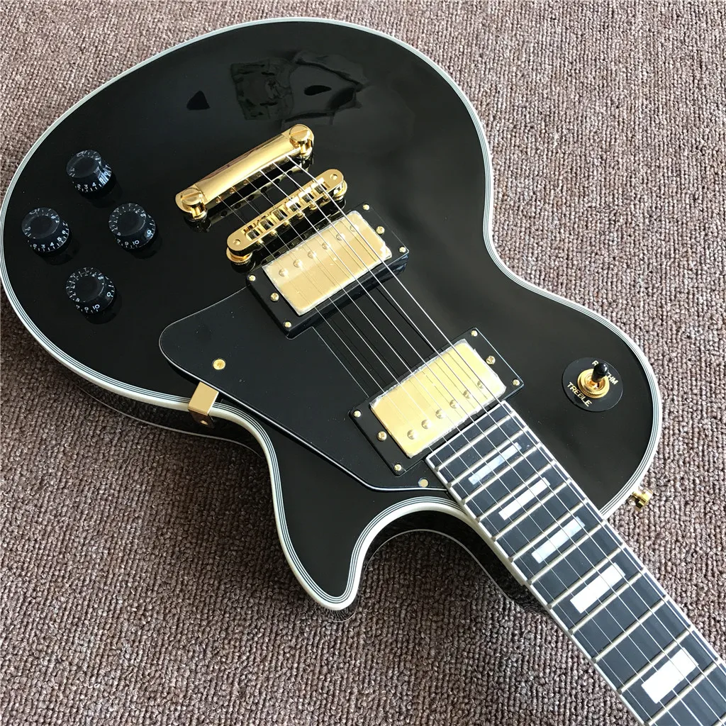 Новое поступление электрическая гитара с черным грифом и золотистым корпусом