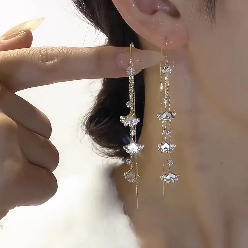 Женские серьги с кисточками и кошачьими глазами