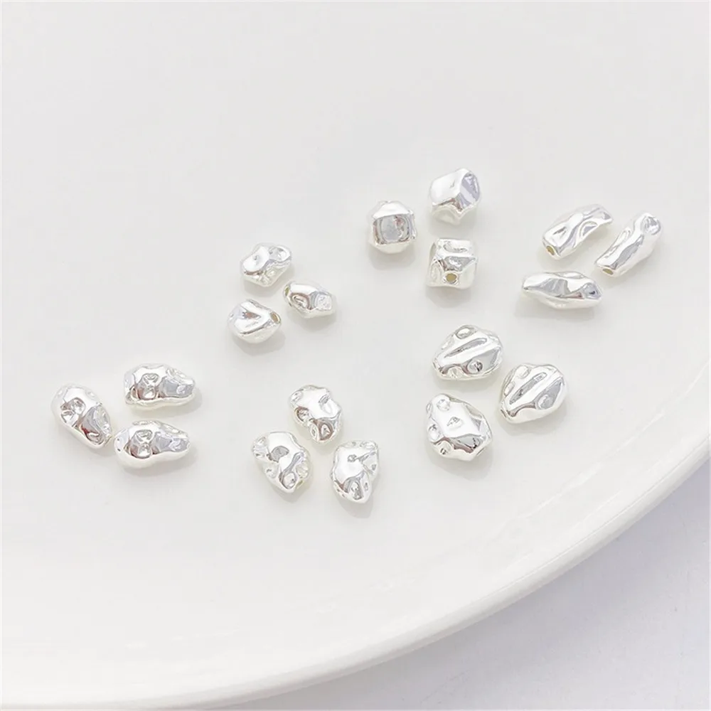 Толстые посеребренные бусины неправильной формы рассыпчатые ручной работы