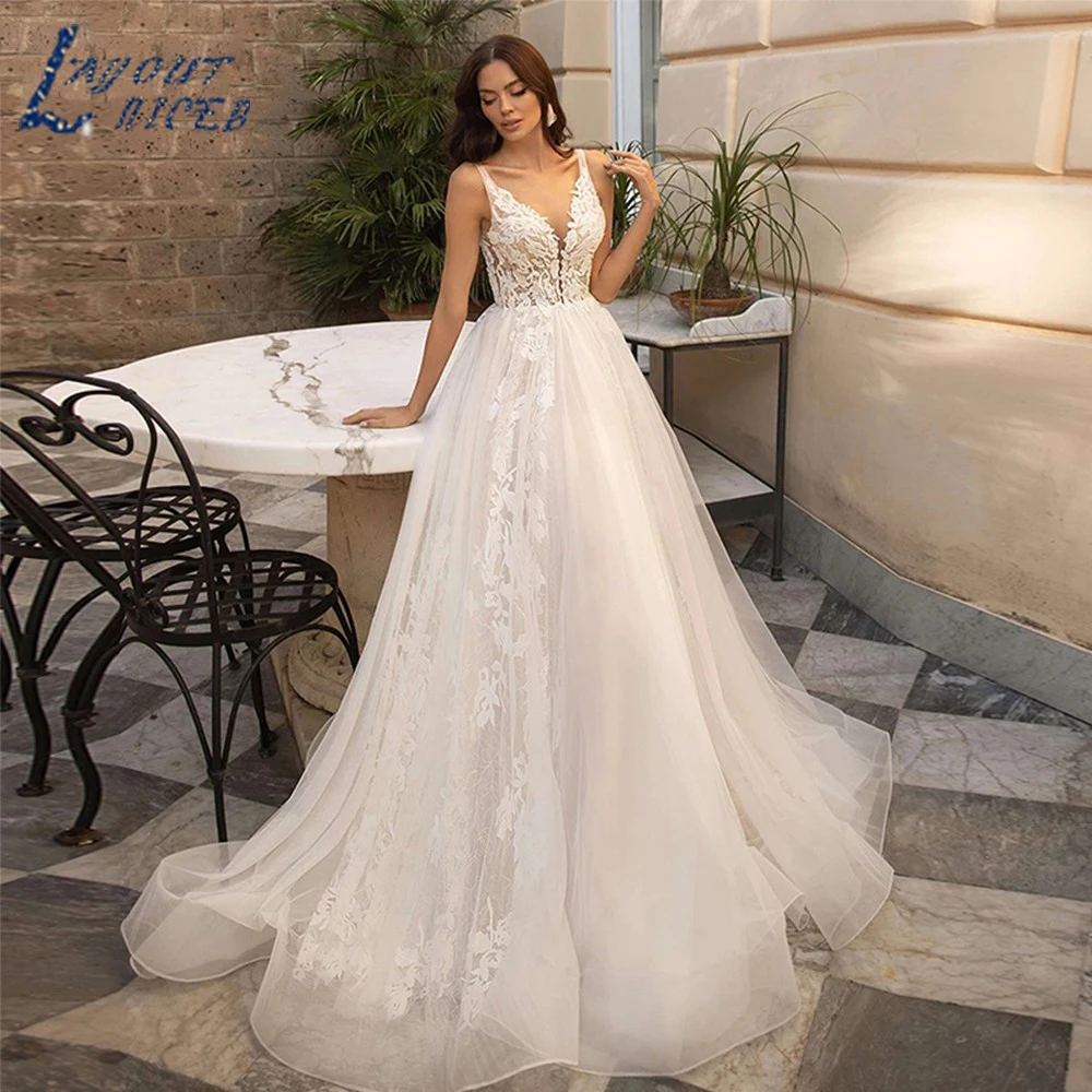 

LAYOUT NICEB Romantic Princess Wedding Dress Sexy Spaghetti Strap V Neck For Bride Gowns Illusion Lace Applique Bridal Dresses