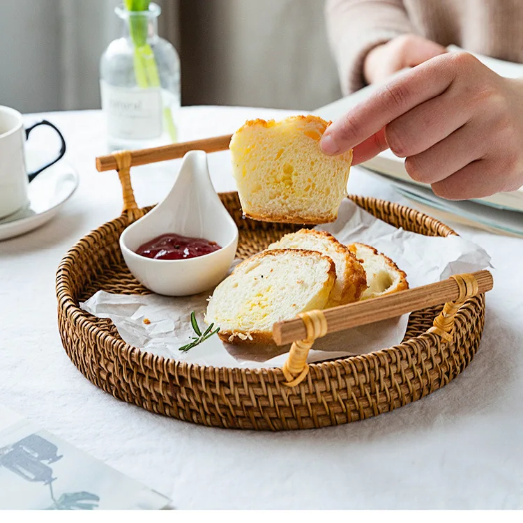 

Handwoven Rattan Storage Tray With Wooden Handle Round Wicker Basket Bread Food Plate Fruit Cake Platter Dinner Serving Tray