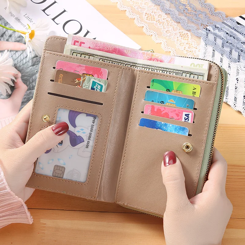 New solid color ladies wrist strap clutch bag fashion Korean version of the long women's zipper wallet large wallet wholesale.