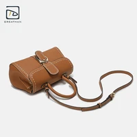 womens luxury designer top handle hand bag with buckle made of leather