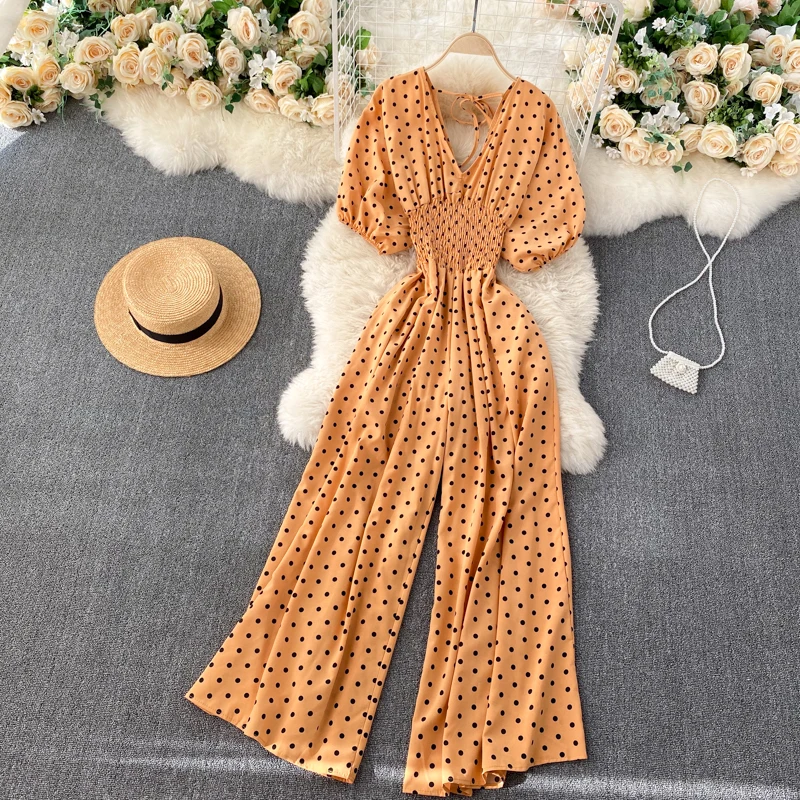 Летний сексуальный комбинезон в горошек для женщин с элегантным V-образным вырезом, расклешенными короткими рукавами и высокой талией, широкими брюками и свободным кроем.