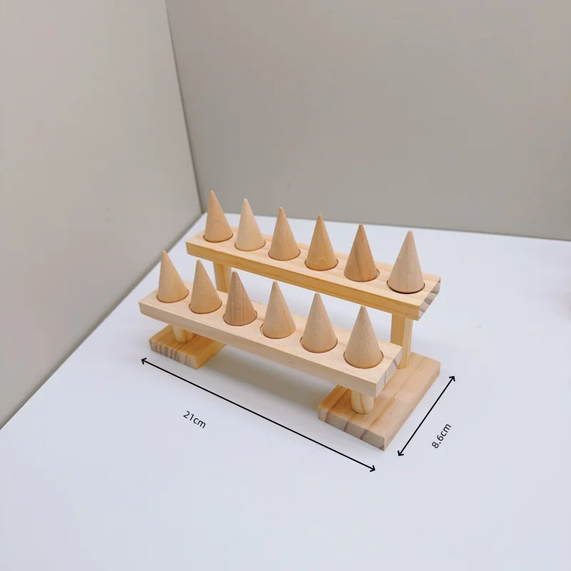 

Деревянная конусная подставка для колец